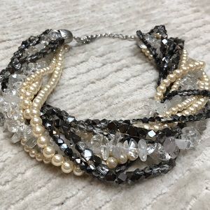 Strands of pearls black iridescent clear beads